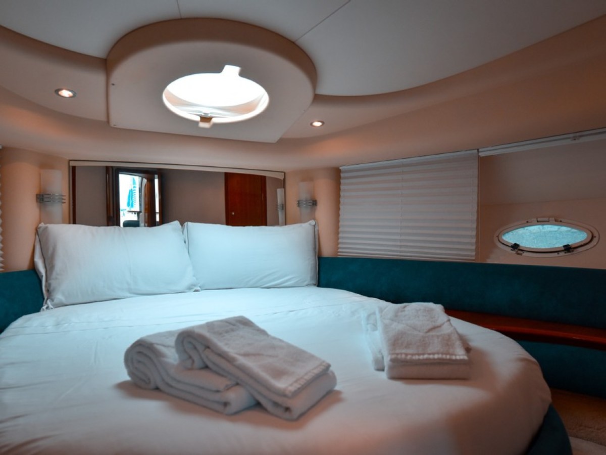 a bedroom with a large bed in a hotel room