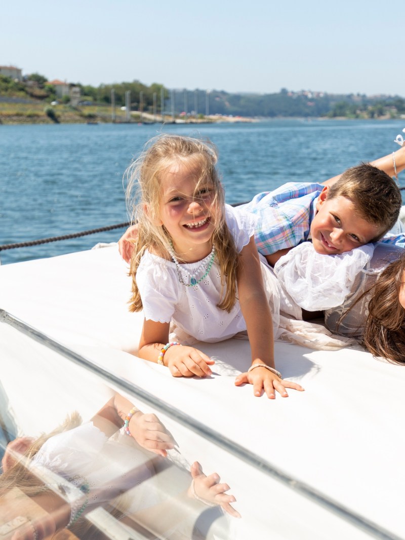 a person sitting on a boat in a body of water