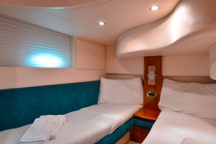 a bedroom with a bed in a room