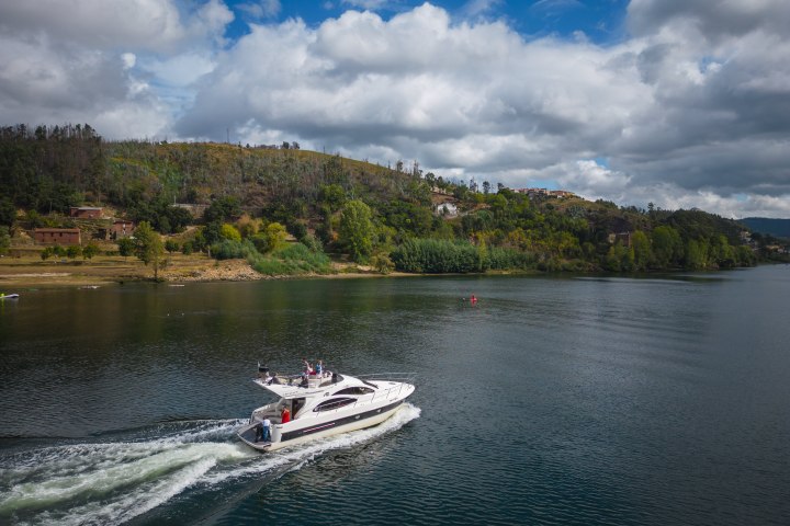 a small boat in a body of water