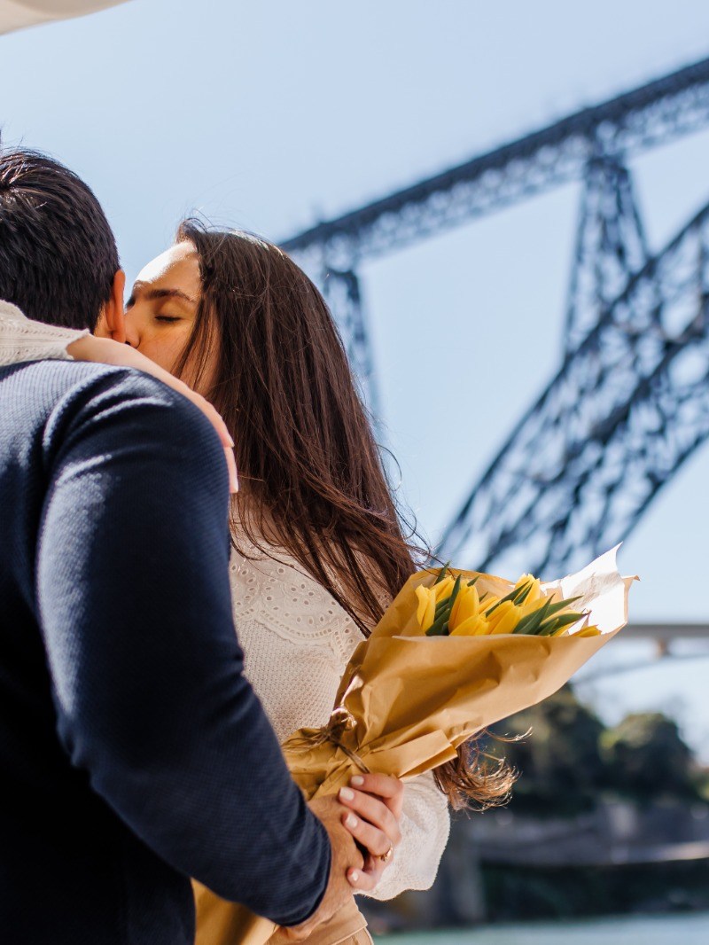 person standing on a bridge, rio douro, porto