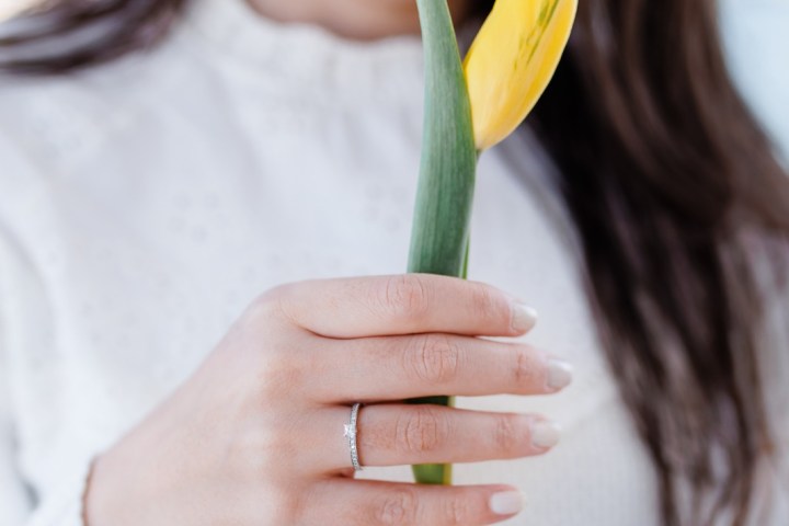 a woman holding a banana