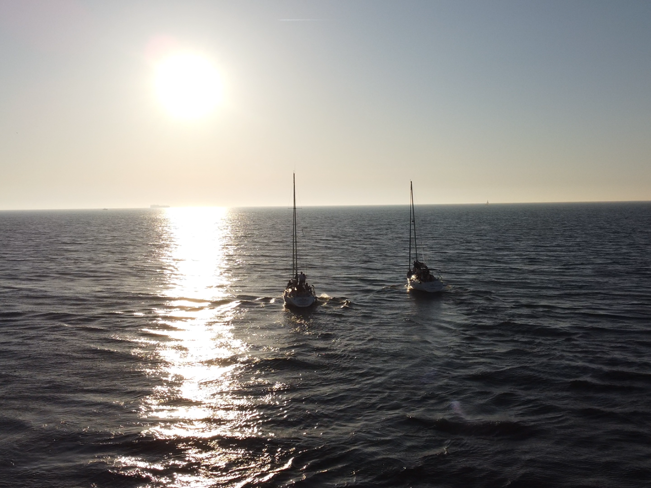 sunset with double sailboat douro river