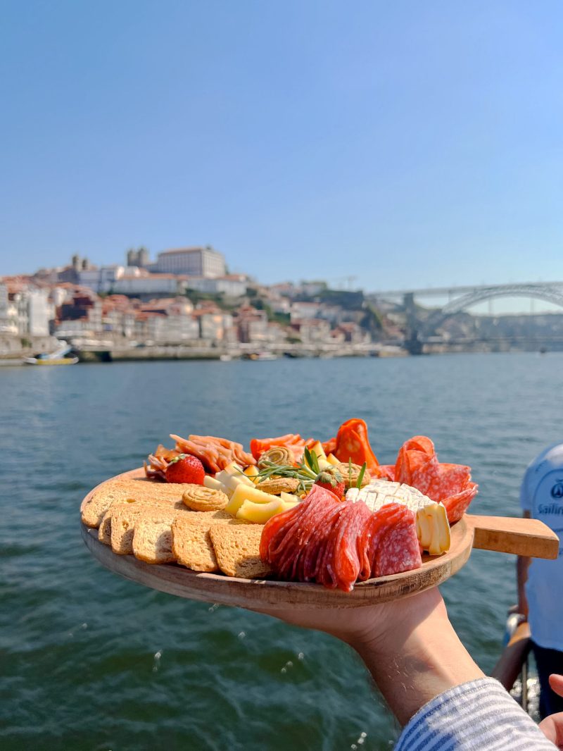 a group of people in a boat on a body of water