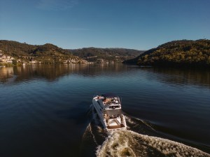 a wooden boat in a body of water