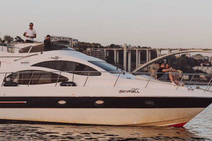 a boat is docked next to a body of water