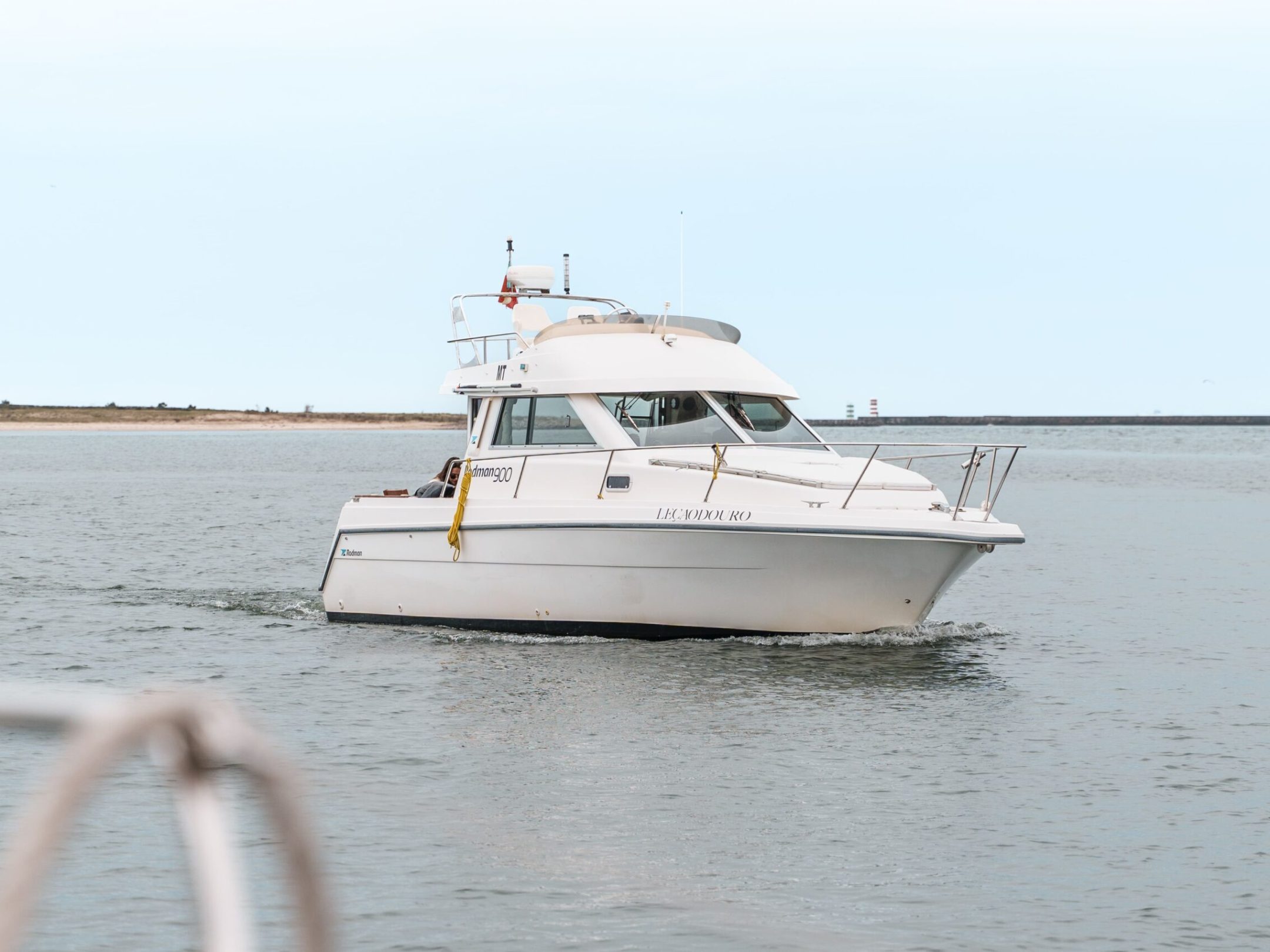 a small boat in a body of water