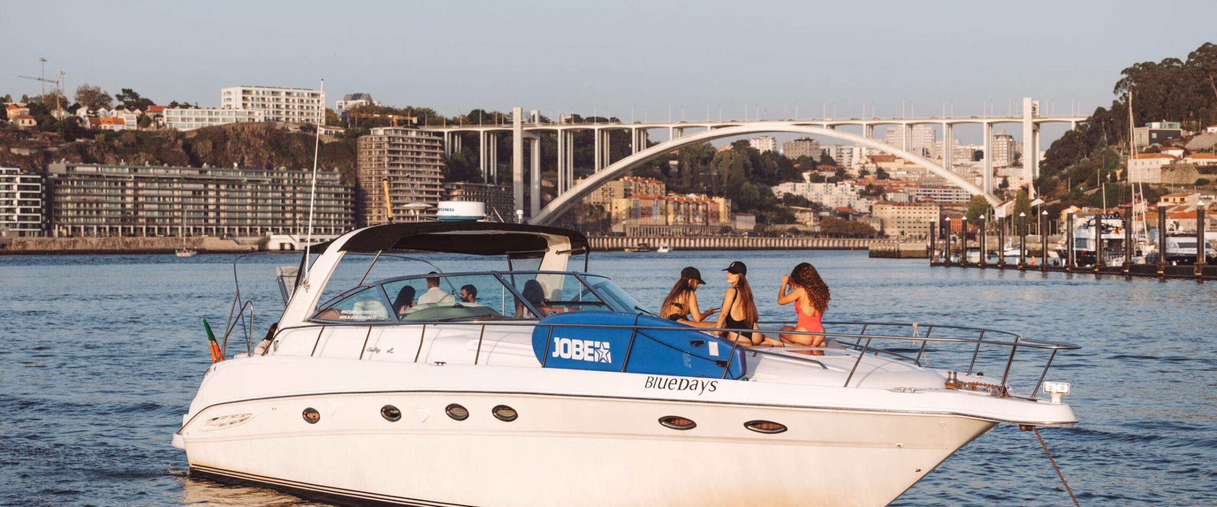 sailling out23-114 a small boat in a body of water