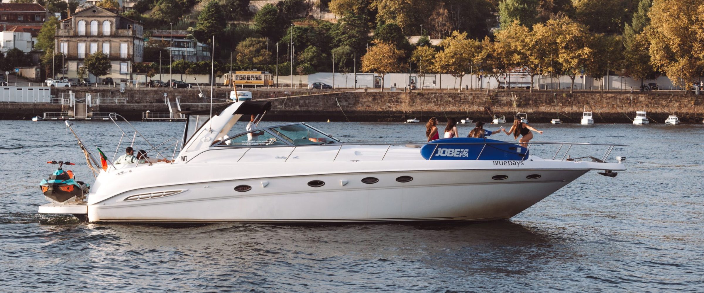 sailling out23-53 a small boat in a body of water