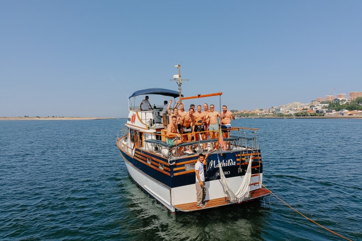 a small boat in a body of water