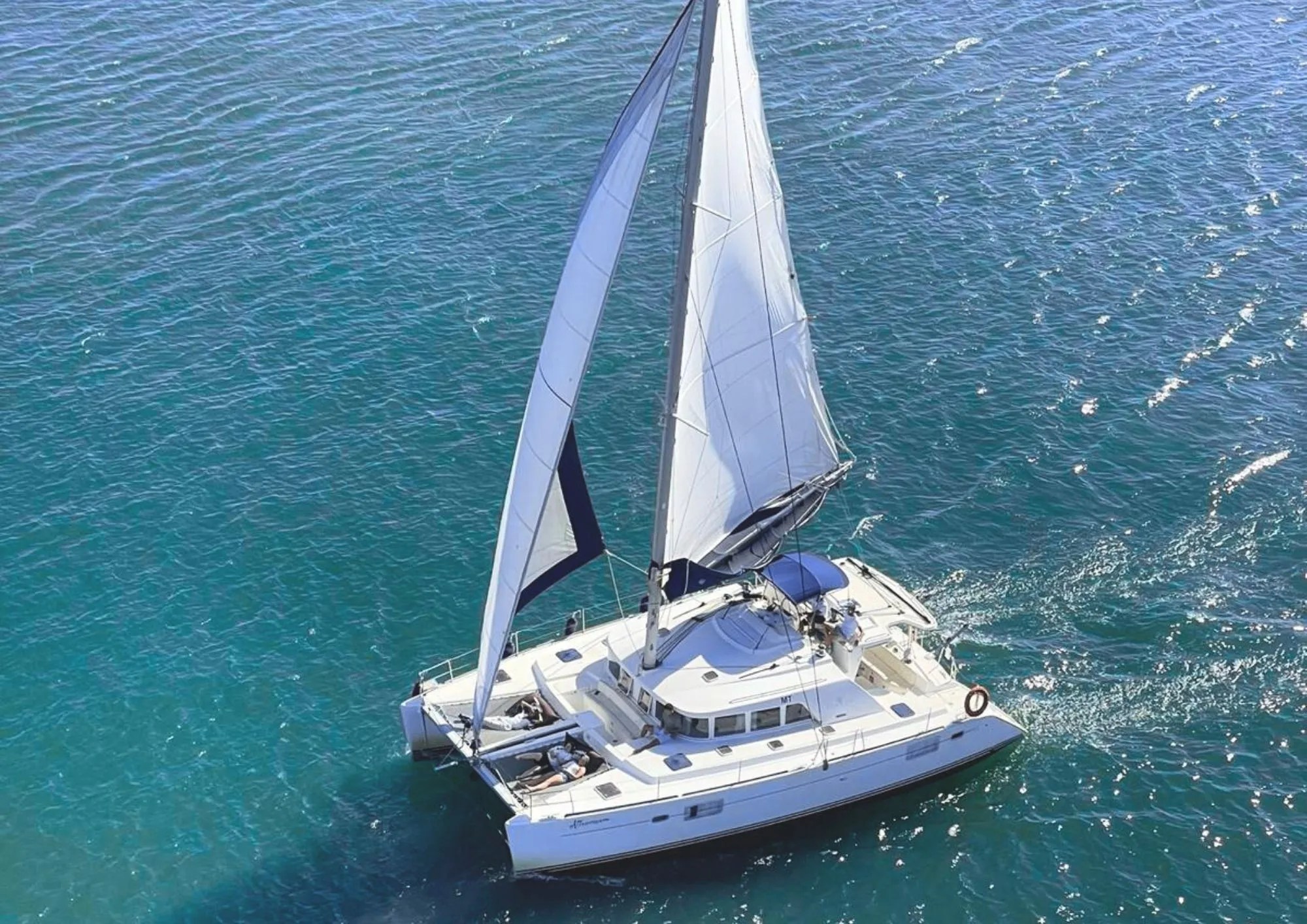 Catamaran Attraversiamo 1 a small boat in a body of water