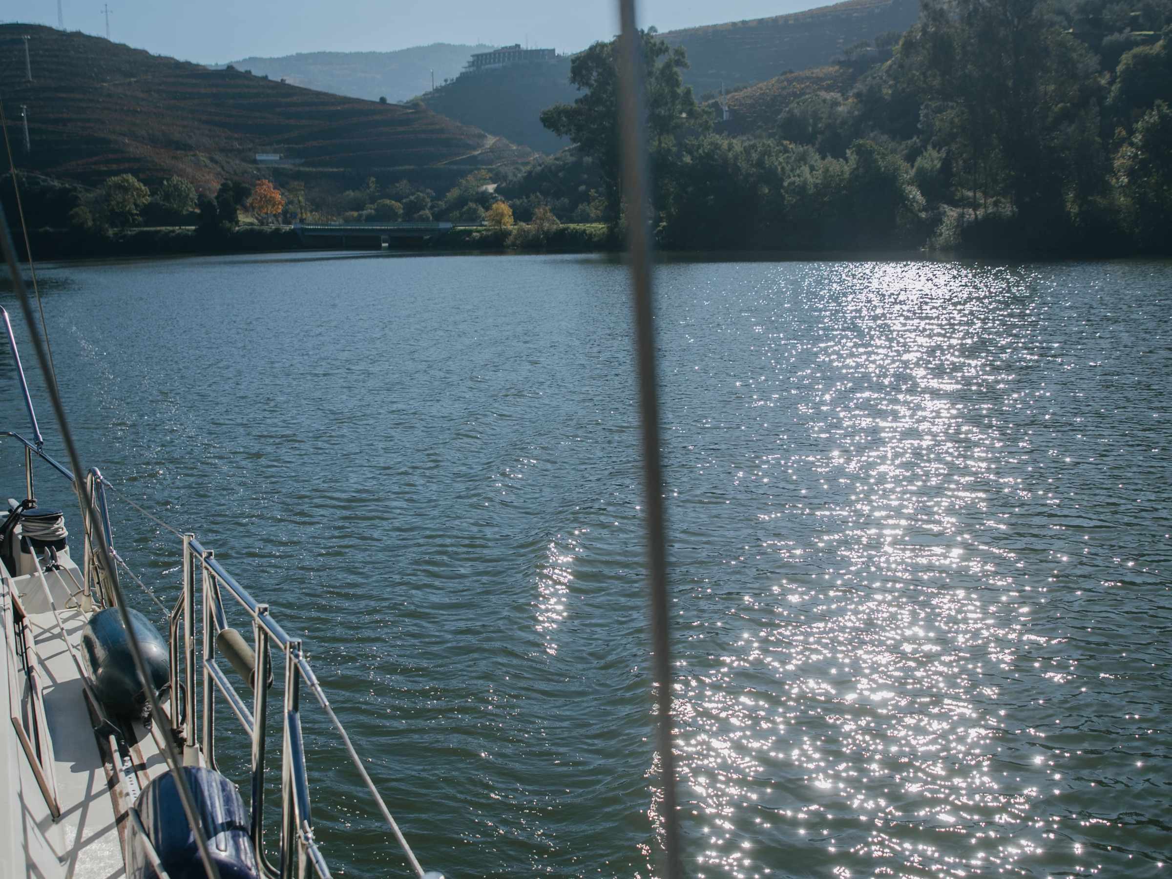 a boat is docked next to a body of water